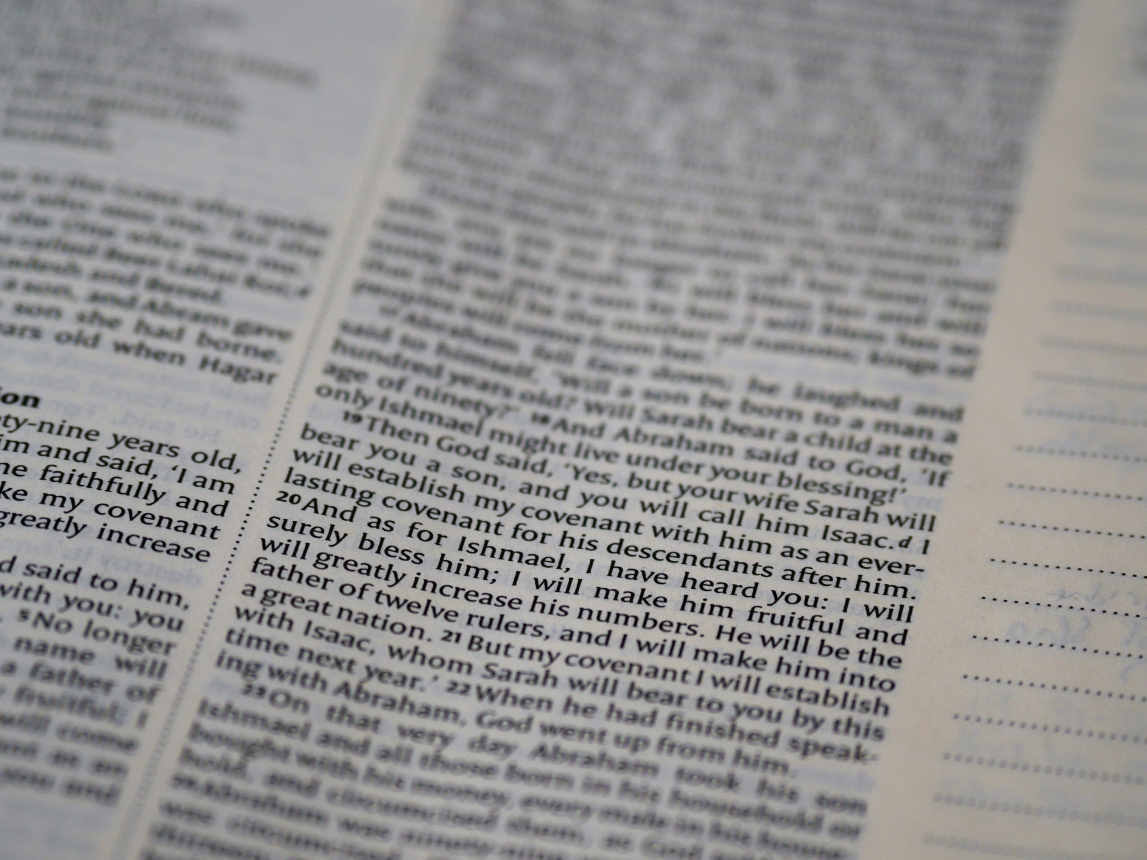 a close up of a newspaper page with words on it